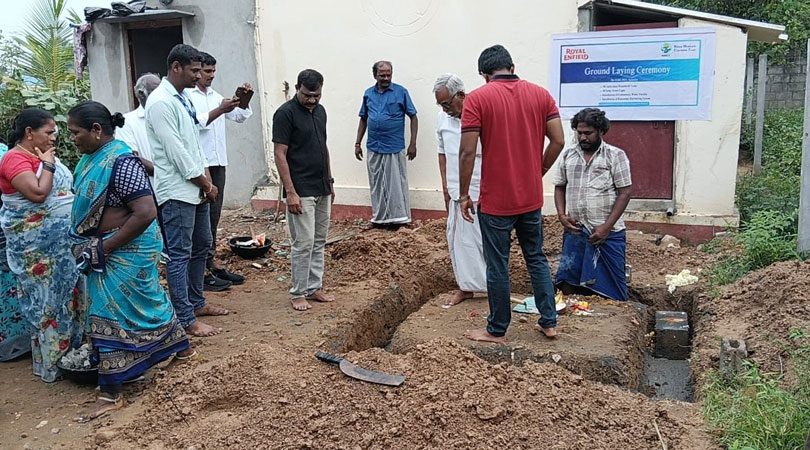 Villagers and NMCT staff at the ground-laying ceremony for a household latrine