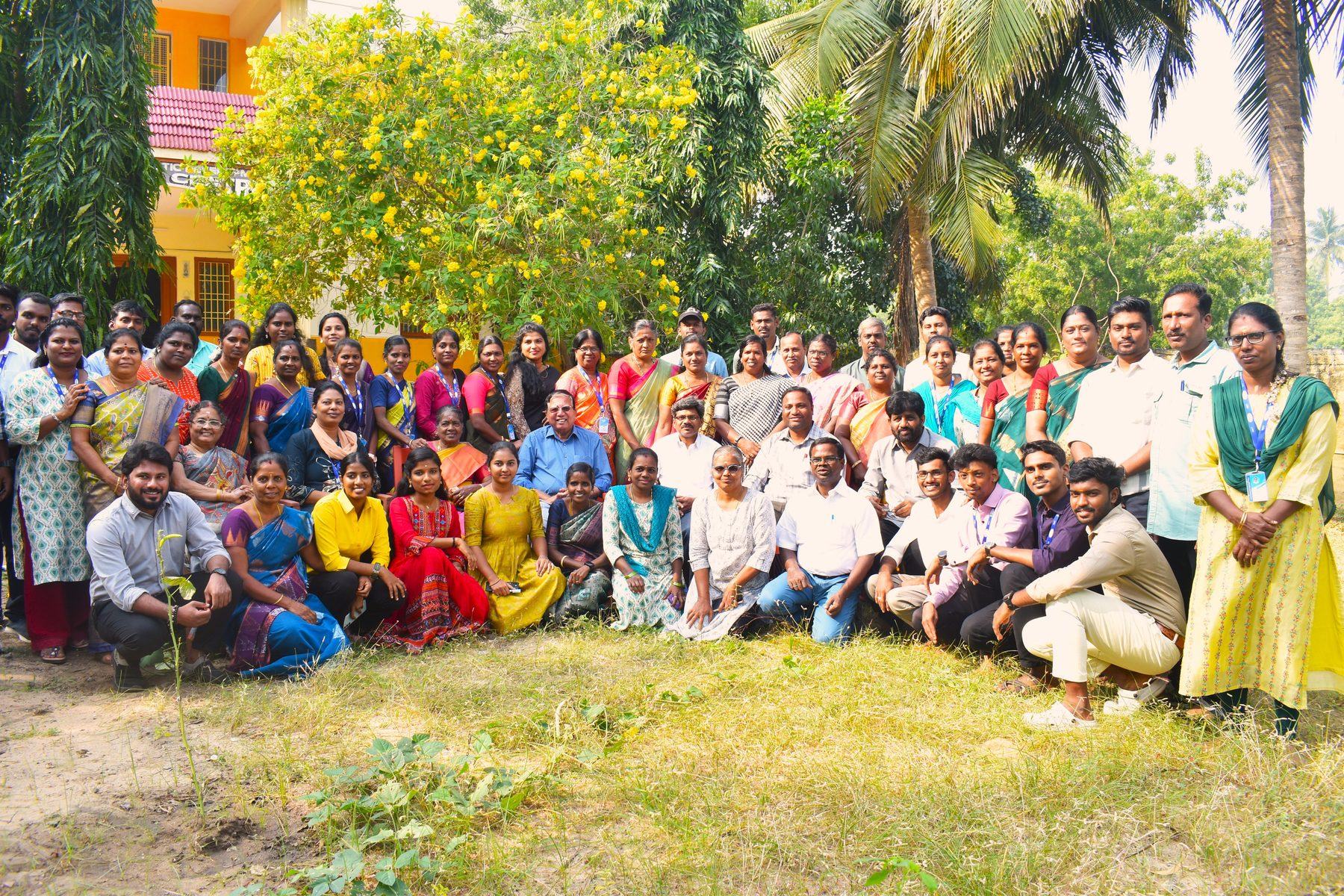 The NMCT staff and field team photographed together outdoors
